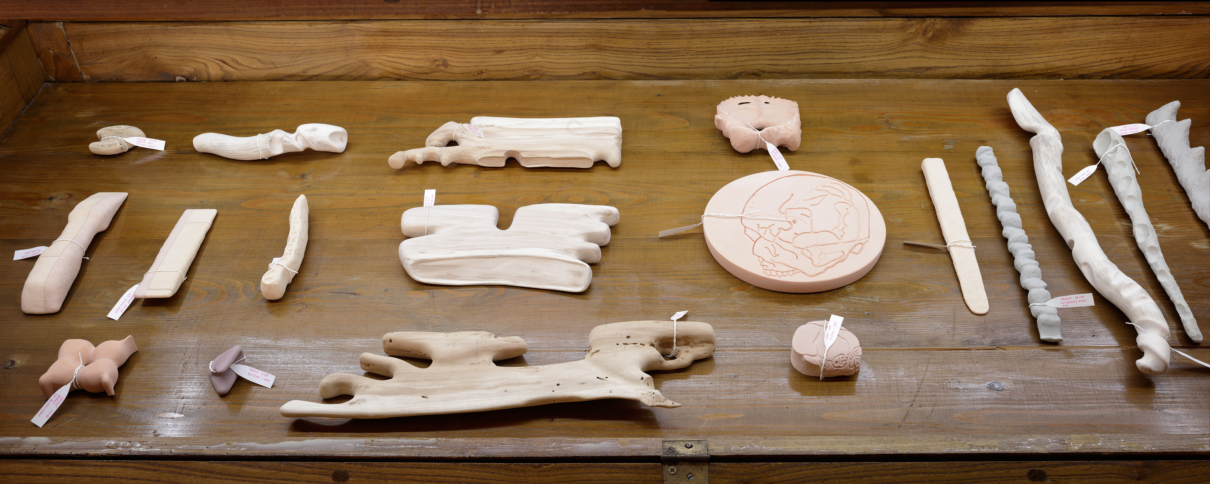 Photo of an art installation called Hands (and Other Products of Labor) 2.0 by Klára Čermáková (Mikulov Art Symposium, Mikulov, Czechia, 2021) [Detail no. 3]. A detailed look at the art objects in one of the “coffins.”